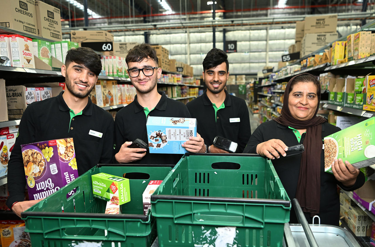 Woolworths Group 42 refugees to Brisbane team